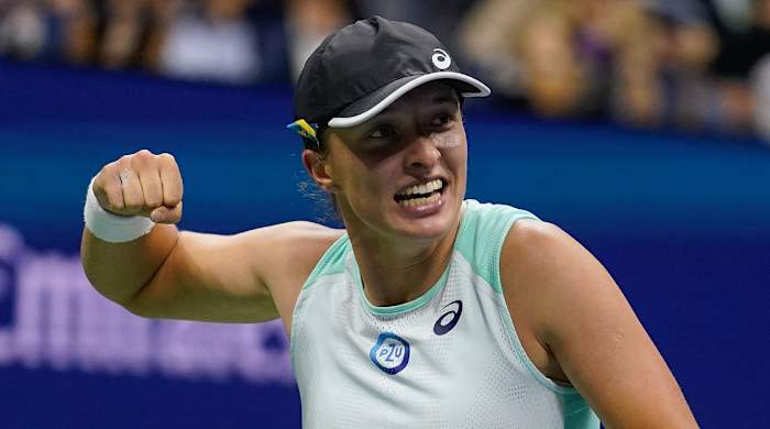 Iga Swiatek, of Poland, reacts after defeating Aryna Sabalenka, of Belarus, during the semifinals of the U.S. Open tennis championships, Thursday, Sept. 8, 2022.